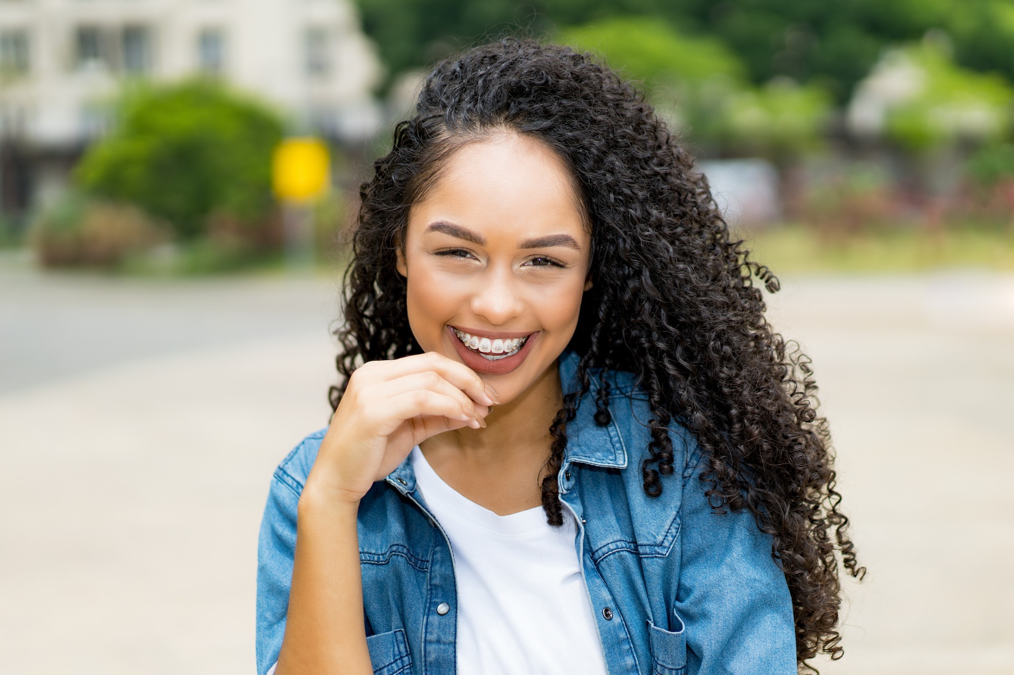 Pretty brazilian young adult woman with retainer orthodontics greenwood village co